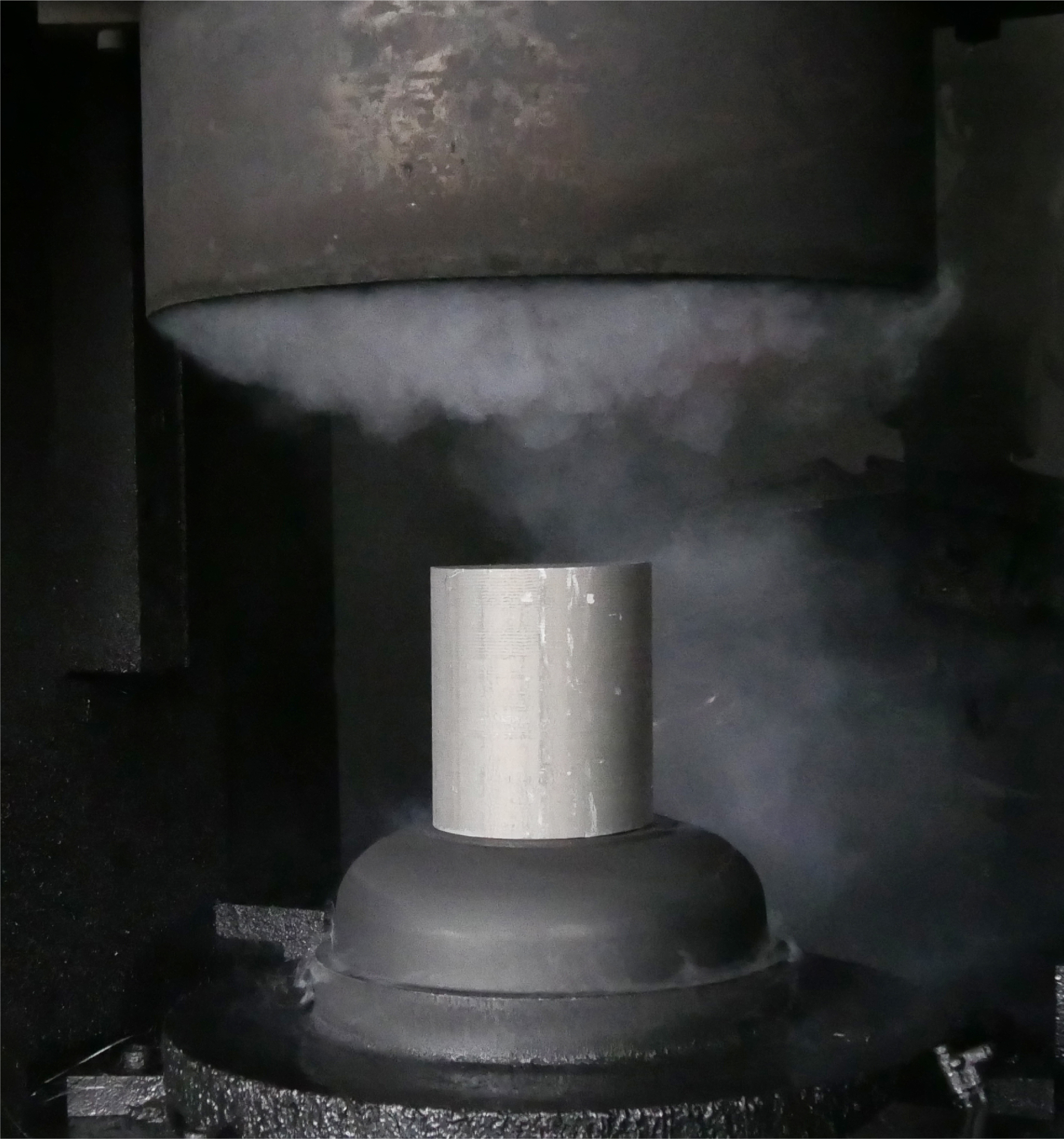 Forging press forming a metal component